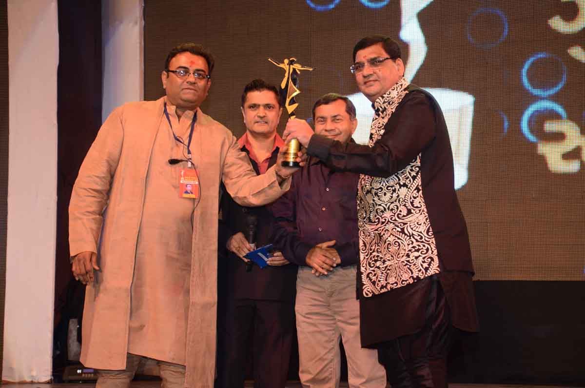 The Transmedia Gujarati Screen & Stage Award presented on stage